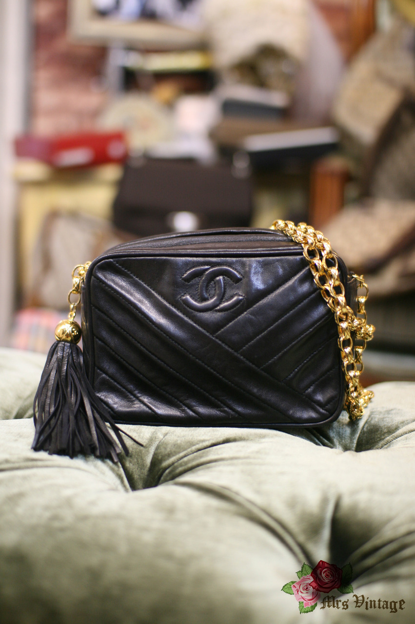 Chanel Vintage Chanel 7 Black Quilted Leather Tassel Pochette