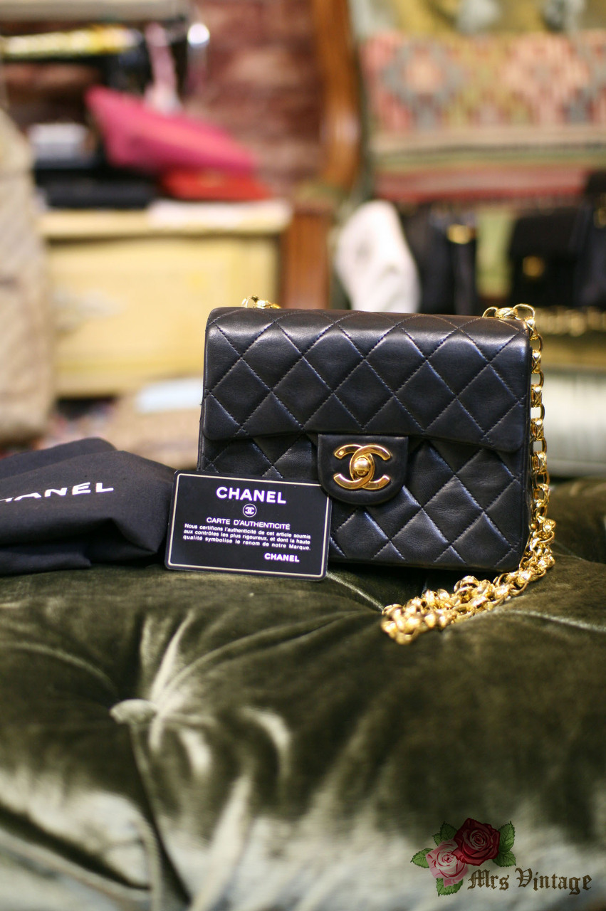 Chanel, Vintage mini black lambskin quilted handbag with gold