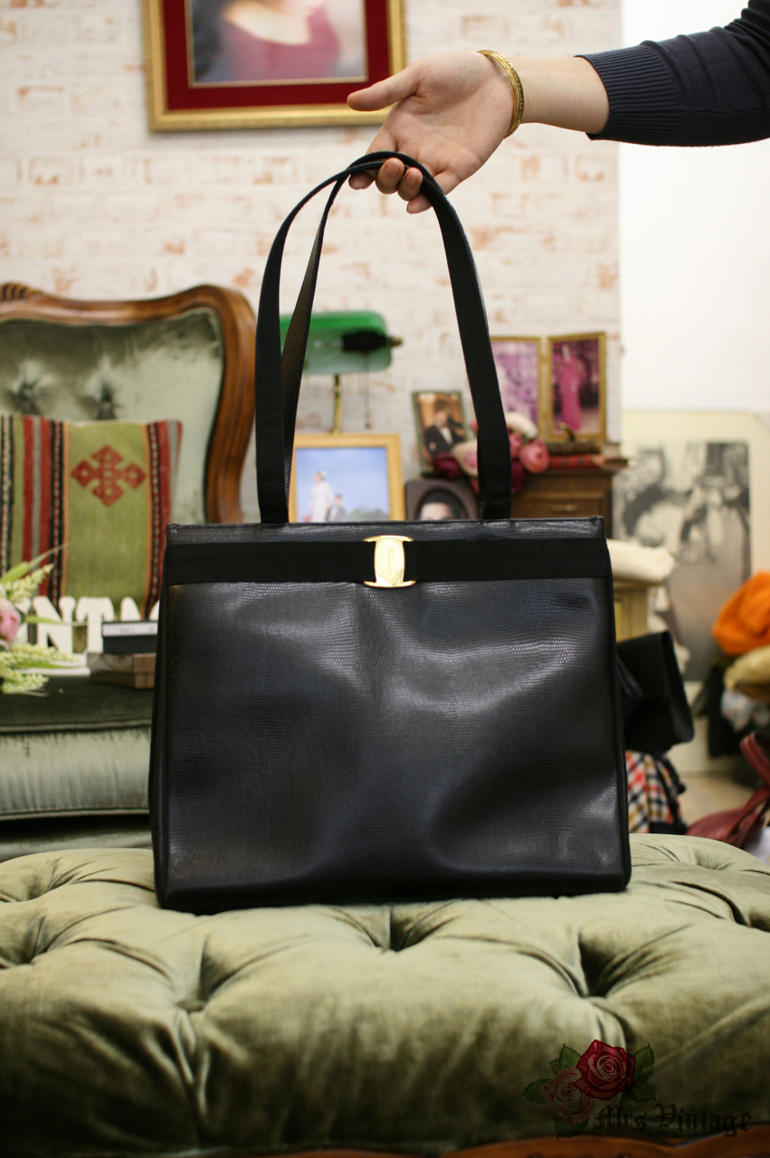 Vintage Salvatore Ferragamo Vara Ribbon Black Lizard Embrossed Leather Tote Bag Mrs Vintage Selling Vintage Wedding Lace Dress Gowns Accessories from 1920s 1990s. And many One of