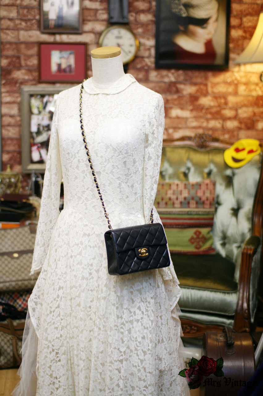 Vintage Chanel Small Lambskin Quilted Leather Bucket Bag with 2 Golden  Straps - Mrs Vintage - Selling Vintage Wedding Lace Dress / Gowns &  Accessories from 1920s – 1990s. And many One