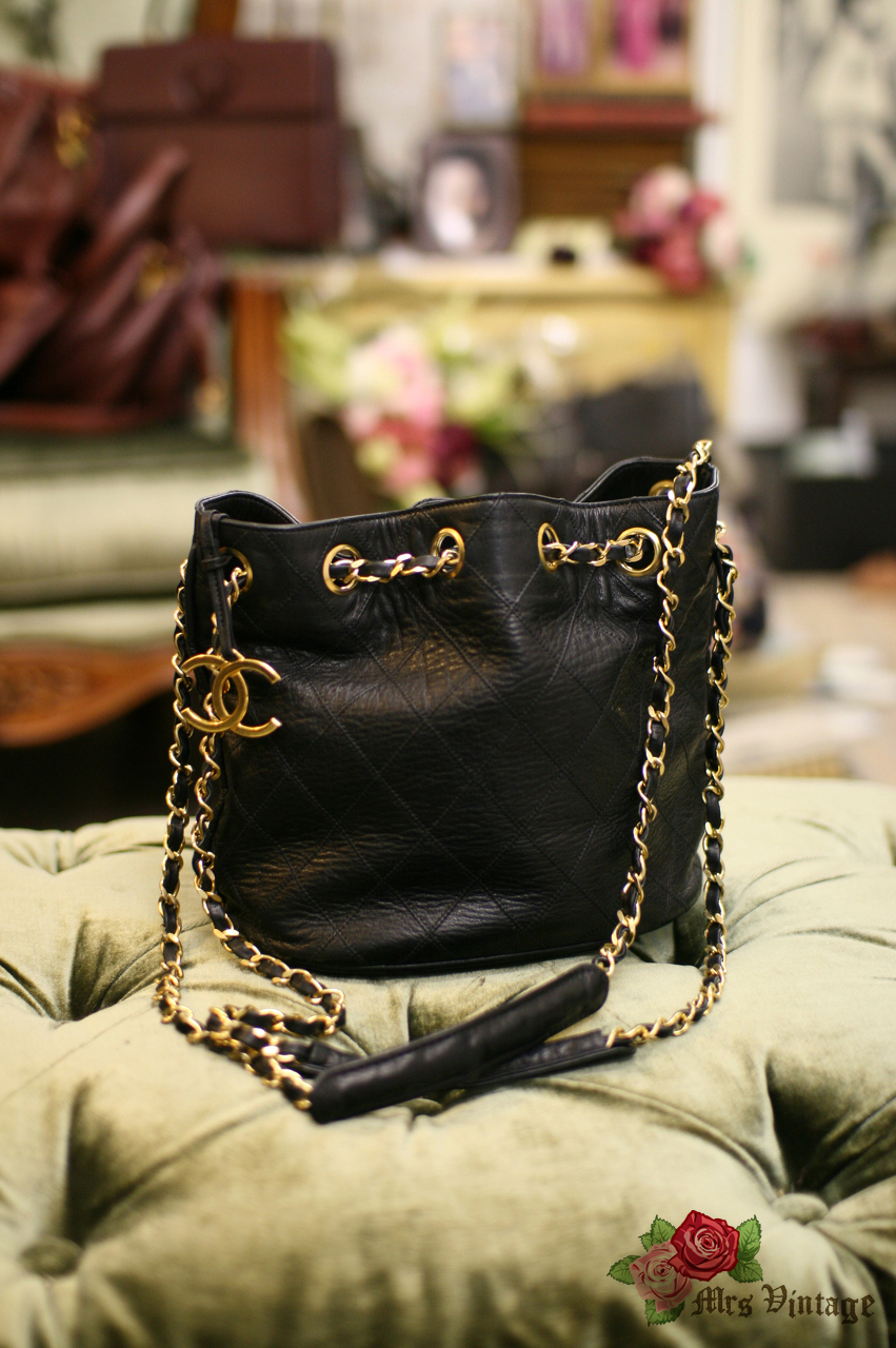 Chanel Shiny Aged Calfskin CC Chain Mini Drawstring Bag Black