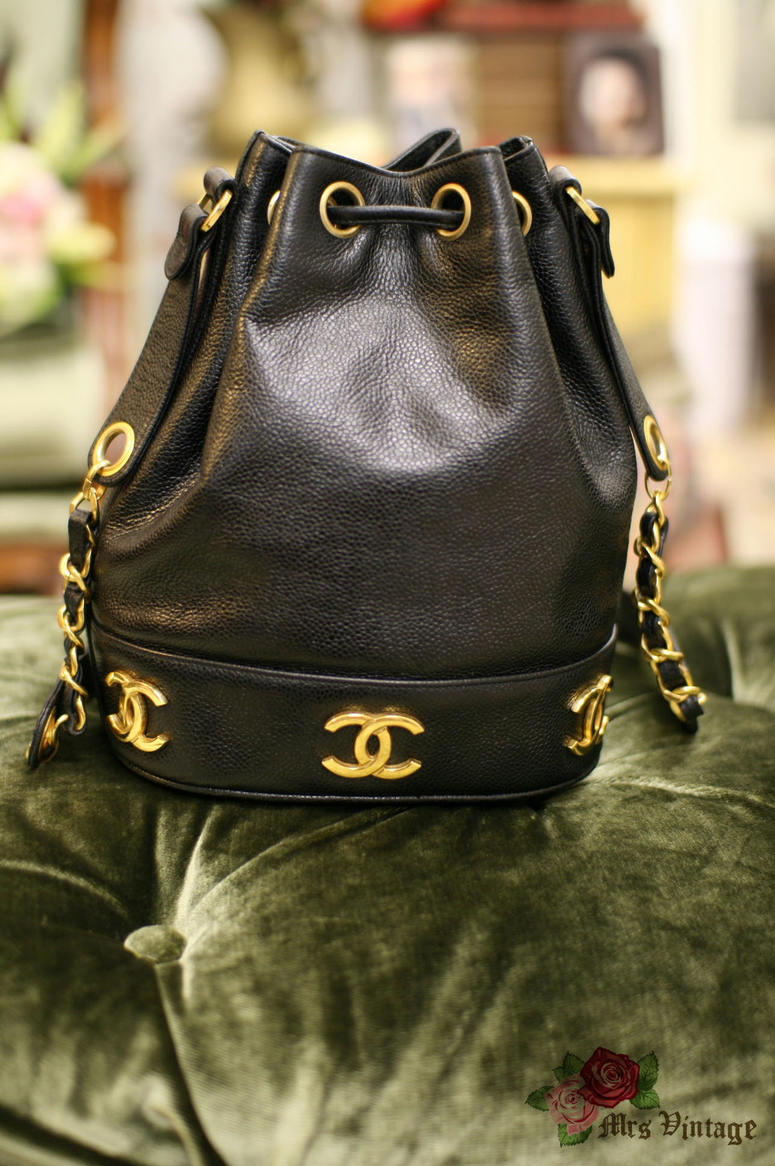 Vintage Chanel Black Caviar Leather Bucket Bag With Golden CC Logo At The  Bottom With Original Pouch Inside - Mrs Vintage - Selling Vintage Wedding  Lace Dress / Gowns & Accessories from