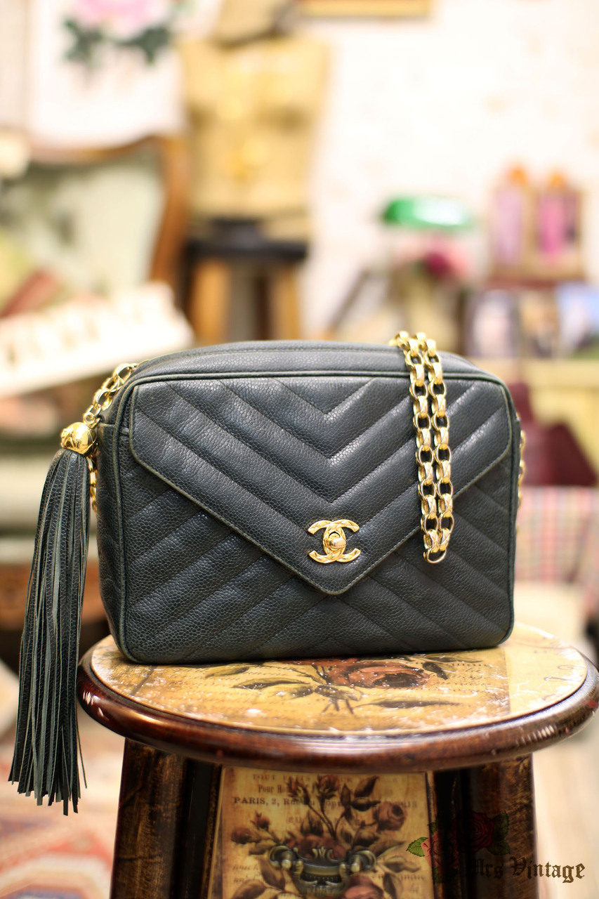 Vintage Chanel dark green camera bag with tassel