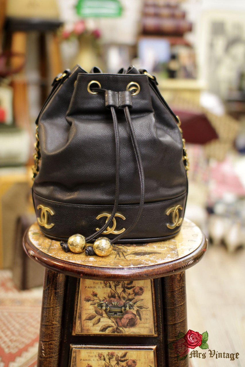 Vintage Chanel Medium Sized Black Caviar Leather Bucket Bag With Golden CC  Logo At The Bottom With Original Pouch Inside - Mrs Vintage - Selling  Vintage Wedding Lace Dress / Gowns 
