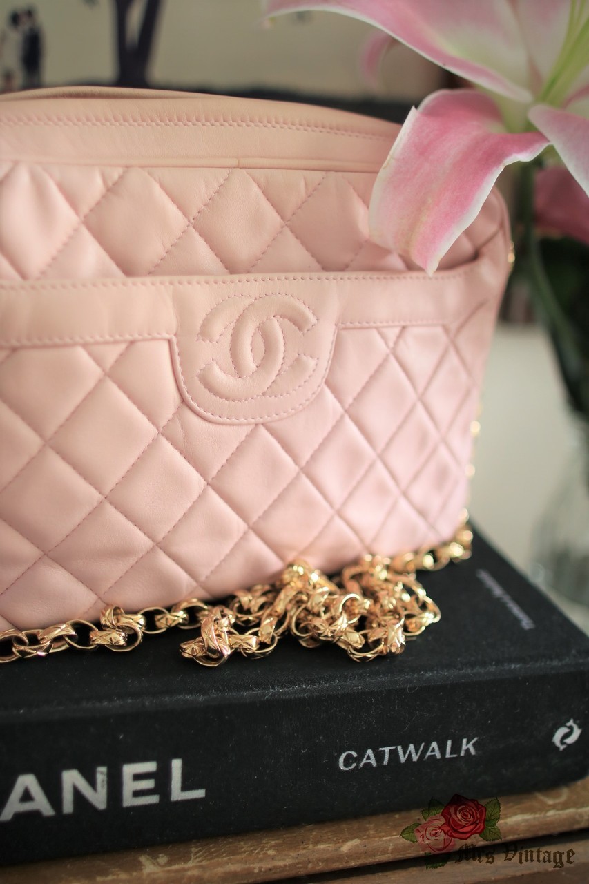 women pink chanel bag vintage