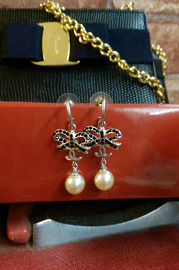 Authentic Pre Own Chanel Bow Style with a Faux Pearl Earrings