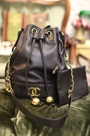Vintage Chanel Black Medium Caviar Leather Bucket Bag With Golden CC Logo At The Bottom With Original Pouch Inside